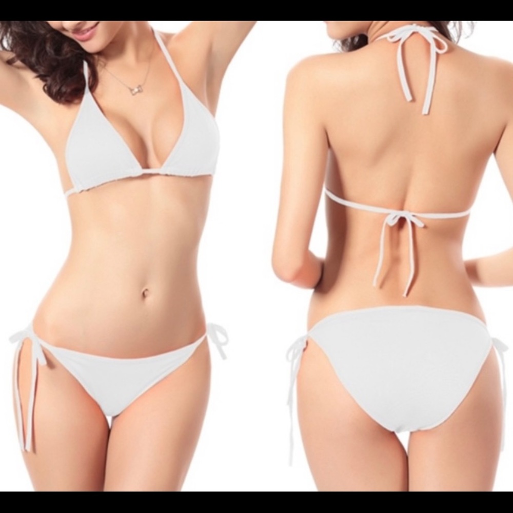 NEW White String Bikini - New in sealed bag
Never worn white one size adjustable